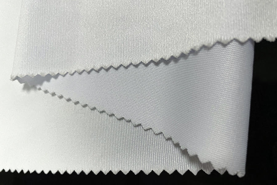 ¿Cuáles son las características y aplicaciones clave de los tejidos de malla de poliéster DTY y cómo contribuyen al rendimiento y la versatilidad de los textiles en diversas industrias?